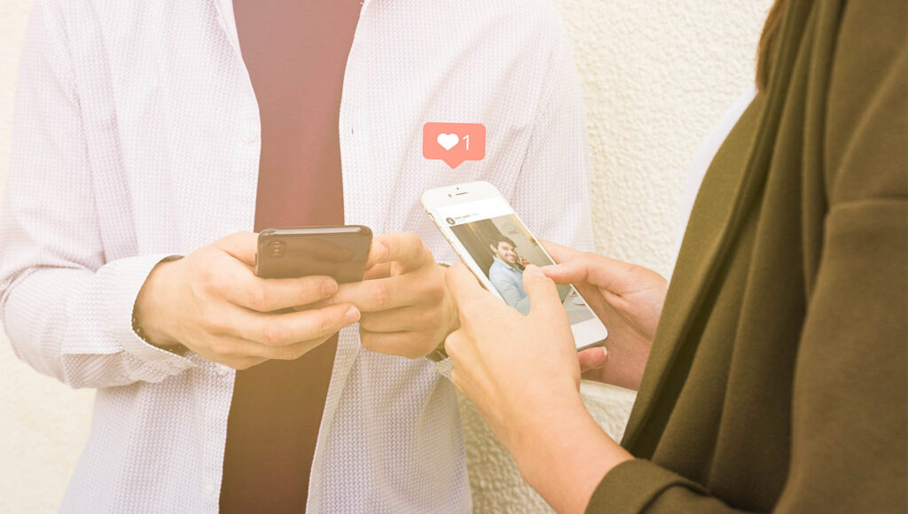 Woman using social networking application on mobile phone